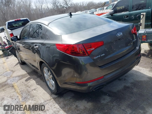 2013 Kia Optima EX with VIN 5XXGN4A77DG234921, listed as a IAAI auction lot 41823669 with 168,460 mi miles. Bid and sale history available at carsss.com. Image 3.