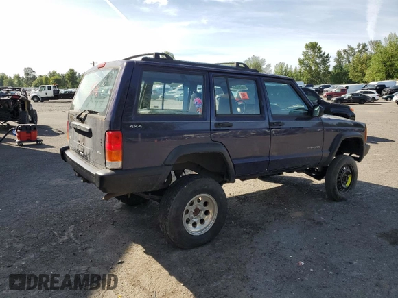 1999 Jeep Cherokee SE with VIN 1J4FF28S0XL541871, listed as a Copart auction lot 59250264 with Not provided miles and Salvage title. Bid and sale history available at DreamBid. Image 3.
