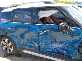 2022 MINI Countryman Cooper S z VIN WMZ53BR07N3N34260, wystawiony jako IAAI lot #42137868 z przebiegiem Nie podano mil oraz . Historia ofert i sprzedaży dostępna na DreamBid. Obrazek 12.
