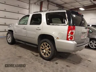 2013 GMC Yukon SLT with VIN 1GKS2CE06DR323343, listed as a IAAI auction lot 41643959 with 246,658 mi miles. Bid and sale history available at carsss.com. Image 3.