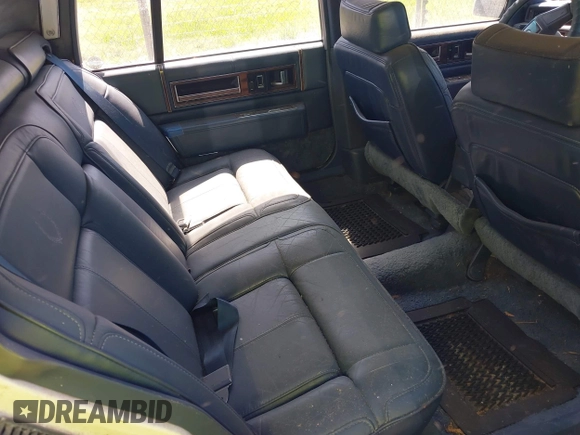 1989 Cadillac DeVille z VIN 1G6CD5159K4342392, wystawiony jako IAAI lot #42451638 z przebiegiem 162 687 mil mil oraz . Historia ofert i sprzedaży dostępna na DreamBid. Obrazek 8.