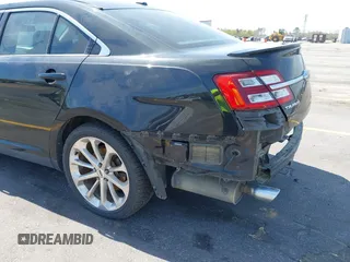 2015 Ford Taurus Limited with VIN 1FAHP2J81FG134973, listed as a IAAI auction lot 41845384 with 139,203 mi miles. Bid and sale history available at carsss.com. Image 18.