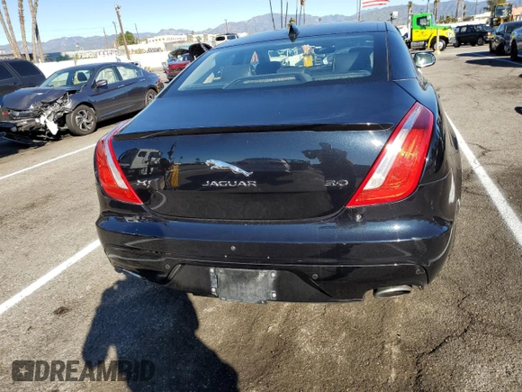 2018 Jaguar XJ with VIN SAJWA1C79J8W14555, listed as a Copart auction lot 39950303 with 86,316 mi miles. Bid and sale history available at carsss.com. Image 6.