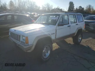 1993 Jeep Cherokee Country with VIN 1J4FJ78S0PL565292, listed as a Copart auction lot 83214974 with 233,925 mi miles and Clean Title. Bid and sale history available at carsss.com. Image 1.