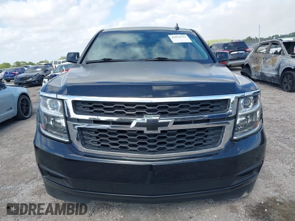 2017 Chevrolet Tahoe LS with VIN 1GNSCAKC1HR225698, listed as a IAAI auction lot 42044712 with 89,605 mi miles and . Bid and sale history available at DreamBid. Image 12.