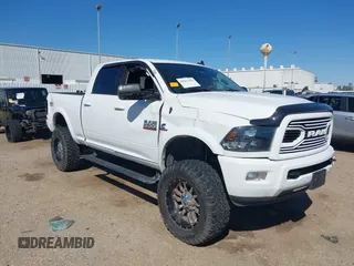2018 Ram 2500 Big Horn with VIN 3C6UR5DL7JG290136, listed as a IAAI auction lot 41823442 with 106,167 mi miles. Bid and sale history available at carsss.com. Image 1.