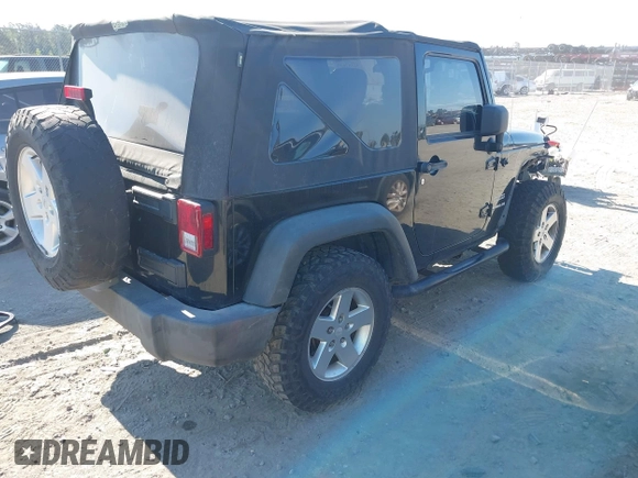 2012 Jeep Wrangler Sport with VIN 1C4AJWAG0CL247103, listed as a IAAI auction lot 42181637 with 159,003 mi miles and . Bid and sale history available at DreamBid. Image 4.