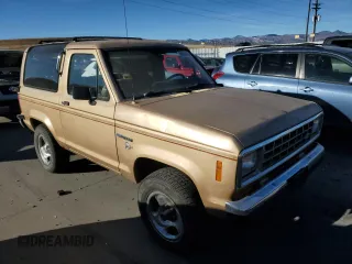 1988 Ford Bronco with VIN 1FMCU14T9JUB53901, listed as a Copart auction lot 84953454 with 222,374 mi miles and Clean title. Bid and sale history available at DreamBid. Image 4.