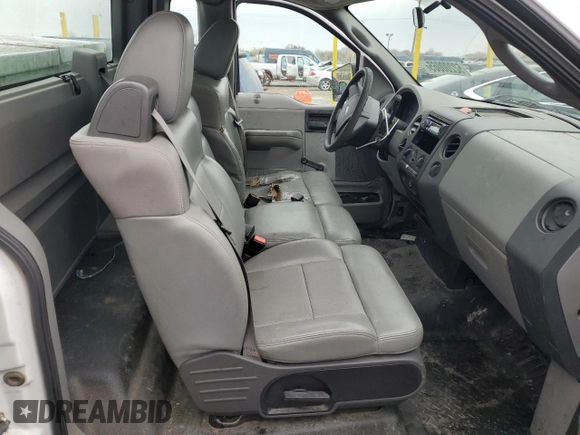 2005 Ford F-150 XL with VIN 1FTRF12W65NB56941, listed as a Copart auction lot 52200065 with 164,464 mi miles and Salvage title. Bid and sale history available at DreamBid. Image 7.