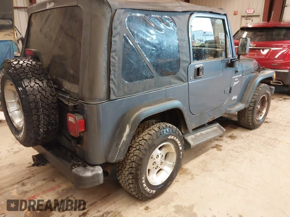 2001 Jeep Wrangler Sport with VIN 1J4FA49SX1P375657, listed as a IAAI auction lot 41943331 with 170,640 mi miles. Bid and sale history available at carsss.com. Image 4.