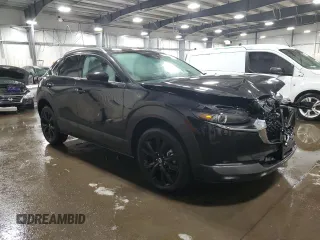 2021 Mazda CX-30 Premium with VIN 3MVDMBDY3MM254689, listed as a Copart auction lot 47817405 with 43,393 mi miles and Salvage Title. Bid and sale history available at carsss.com. Image 4.
