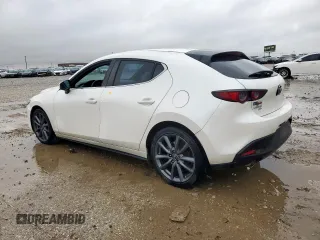 2019 Mazda 3 with VIN JM1BPBJM2K1136404, listed as a Copart auction lot 60378665 with 61,903 mi miles and Salvage title. Bid and sale history available at DreamBid. Image 2.