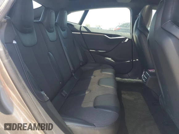 2016 Tesla Model S 90D z VIN 5YJSA1E20GF153799, wystawiony jako Copart lot #56104665 z przebiegiem 115 674 mil mil oraz Szkoda całkowita • Salvage title. Historia ofert i sprzedaży dostępna na DreamBid. Obrazek 10.