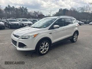 2014 Ford Escape Titanium with VIN 1FMCU9J94EUC63638, listed as a IAAI auction lot 42196241 with 198,112 mi miles and . Bid and sale history available at DreamBid. Image 2.