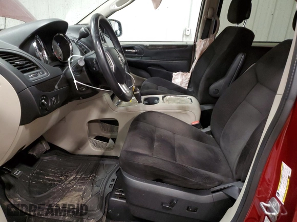 2014 Dodge Grand Caravan SXT z VIN 2C4RDGCG2ER239110, wystawiony jako Copart lot #57247855 z przebiegiem 94 126 mil mil oraz Nie do naprawy. Historia ofert i sprzedaży dostępna na DreamBid. Obrazek 7.