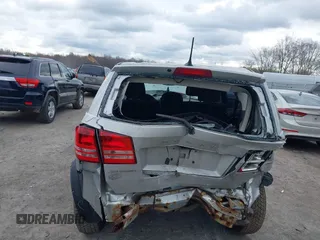 2013 Dodge Journey SE with VIN 3C4PDCAB9DT532554, listed as a IAAI auction lot 42026129 with 164,599 mi miles. Bid and sale history available at carsss.com. Image 6.