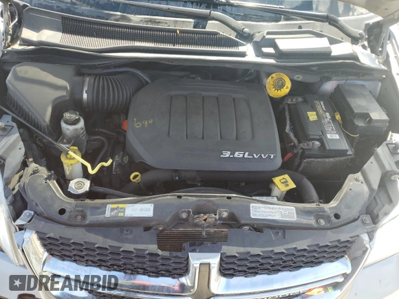 2014 Dodge Grand Caravan SE 30th Anniversary with VIN 2C4RDGBG4ER425068, listed as a Copart auction lot 55839615 with 149,578 mi miles and Non Repairable. Bid and sale history available at DreamBid. Image 12.