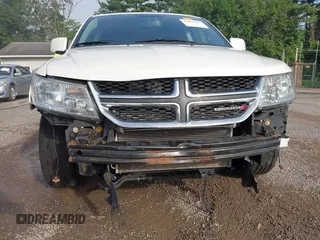 2013 Dodge Journey Crew with VIN 3C4PDCDG0DT591533, listed as a IAAI auction lot 42630548 with 164,961 mi miles and . Bid and sale history available at DreamBid. Image 6.