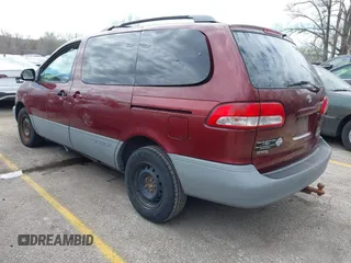 2001 Toyota Sienna LE with VIN 4T3ZF13C71U345315, listed as a IAAI auction lot 41887275 with 253,432 mi miles. Bid and sale history available at carsss.com. Image 3.