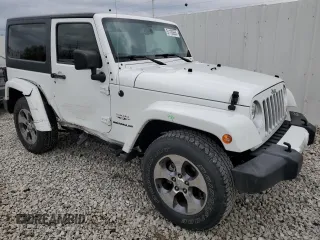 2016 Jeep Wrangler Sahara with VIN 1C4AJWBG5GL157885, listed as a Copart auction lot 51100655 with 73,090 mi miles and Salvage title. Bid and sale history available at DreamBid. Image 4.