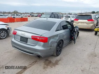 2015 Audi A6 3.0T Premium Plus with VIN WAUFGAFC9FN047047, listed as a IAAI auction lot 41328488 with 83,840 mi miles. Bid and sale history available at carsss.com. Image 4.