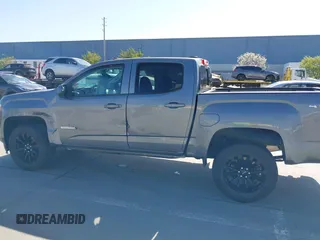2022 GMC Canyon 4WD Elevation z VIN 1GTG6CENXN1304361, wystawiony jako IAAI lot #41990960 z przebiegiem 23 151 mil mil oraz . Historia ofert i sprzedaży dostępna na DreamBid. Obrazek 14.