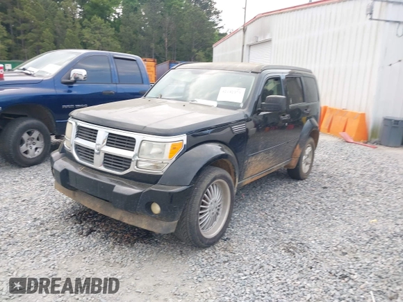 2007 Dodge Nitro SXT z VIN 1D8GU28K97W727361, wystawiony jako IAAI lot #42142970 z przebiegiem 144 579 mil mil oraz . Historia ofert i sprzedaży dostępna na DreamBid. Obrazek 2.