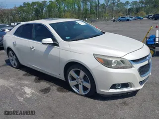 2014 Chevrolet Malibu LTZ with VIN 1G11J5SX4EF270306, listed as a IAAI auction lot 41891752 with 137,446 mi miles. Bid and sale history available at carsss.com. Image 1.