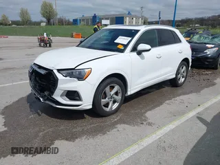 2021 Audi Q3 Premium with VIN WA1AUCF33M1096437, listed as a IAAI auction lot 41910411 with 86,837 mi miles and . Bid and sale history available at DreamBid. Image 19.