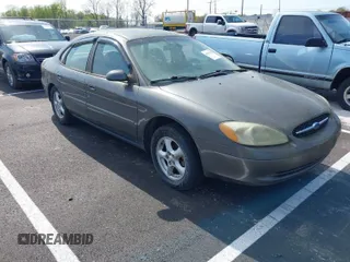 2003 Ford Taurus SE Standard with VIN 1FAFP53U73A172449, listed as a IAAI auction lot 41933160 with 230,002 mi miles. Bid and sale history available at carsss.com. Image 1.