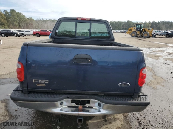 2003 Ford F-150 XL with VIN 1FTRX07273KB66549, listed as a Copart auction lot 83552004 with 205,026 mi miles and Salvage Title. Bid and sale history available at carsss.com. Image 6.