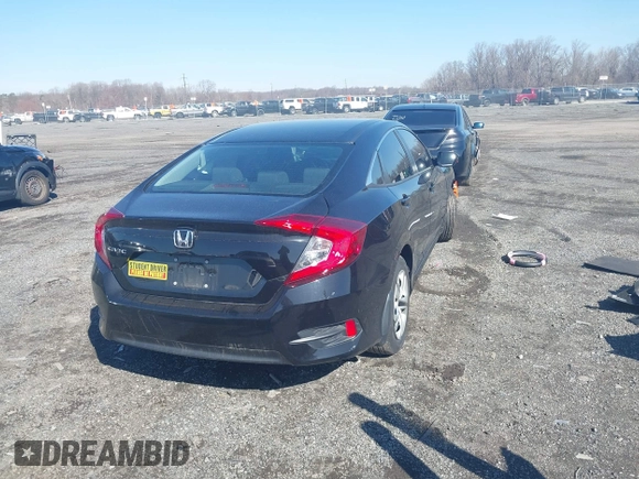 2018 Honda Civic LX with VIN 19XFC2F58JE042456, listed as a IAAI auction lot 41823195 with 45,291 mi miles and . Bid and sale history available at DreamBid. Image 4.