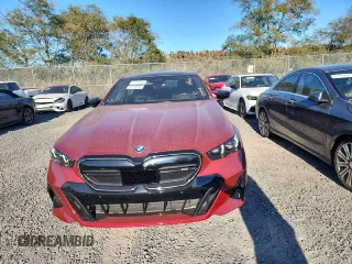 2024 BMW i5 M60 z VIN WBY43FK05RCR29359, wystawiony jako Copart lot #77178394 z przebiegiem 45 mil mil oraz Szkody całkowita. Historia ofert i sprzedaży dostępna na DreamBid. Obrazek 5.