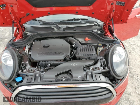 2021 MINI Hardtop 4 Door Oxford Edition z VIN WMWXU7C08M2N49721, wystawiony jako Copart lot #77983324 z przebiegiem 64 096 mil mil oraz Szkoda całkowita • Salvage title. Historia ofert i sprzedaży dostępna na DreamBid. Obrazek 11.