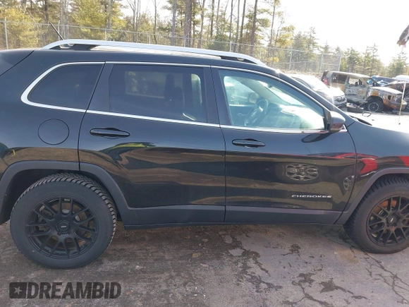 2015 Jeep Cherokee Limited with VIN 1C4PJMDS9FW710969, listed as a IAAI auction lot 41898698 with 144,789 mi miles. Bid and sale history available at carsss.com. Image 13.
