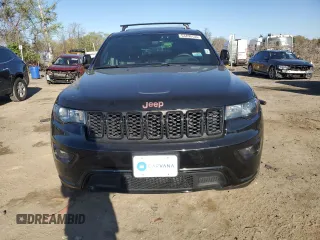 2018 Jeep Grand Cherokee Altitude with VIN 1C4RJFAGXJC296051, listed as a Copart auction lot 53450135 with 65,838 mi miles and Salvage title. Bid and sale history available at DreamBid. Image 5.