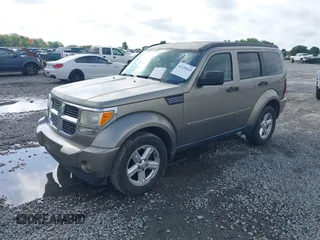 2007 Dodge Nitro SLT z VIN 1D8GT58KX7W689384, wystawiony jako IAAI lot #42139632 z przebiegiem 242 166 mil mil oraz . Historia ofert i sprzedaży dostępna na DreamBid. Obrazek 2.