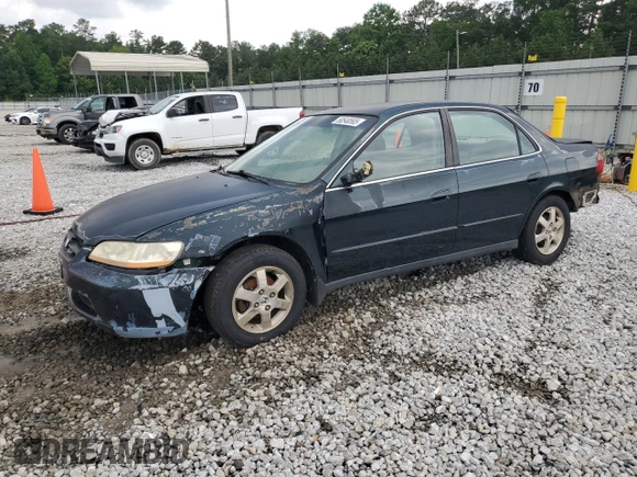 2000 Honda Accord SE with VIN 1HGCG5677YA049486, listed as a Copart auction lot 58548565 with 267,067 mi miles and Salvage title. Bid and sale history available at DreamBid. Image 1.