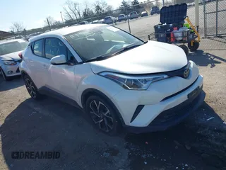 2018 Toyota C-HR XLE with VIN JTNKHMBX3J1011066, listed as a IAAI auction lot 41902651 with 66,874 mi miles. Bid and sale history available at carsss.com. Image 1.