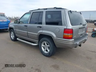 1998 Jeep Grand Cherokee Limited with VIN 1J4GZ88Z6WC307986, listed as a IAAI auction lot 41539972 with 150,652 mi miles. Bid and sale history available at carsss.com. Image 3.