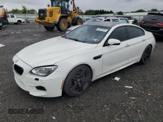 2015 BMW M6 z VIN WBS6C9C56FD467625, wystawiony jako Copart lot #64269363 z przebiegiem 92 698 mil mil oraz Nie do naprawy. Historia ofert i sprzedaży dostępna na DreamBid. Obrazek 1.