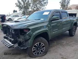 2021 Toyota Tacoma 4WD SR5 with VIN 3TMDZ5BN0MM116198, listed as a IAAI auction lot 41445815 with 59,561 mi miles. Bid and sale history available at carsss.com. Image 18.