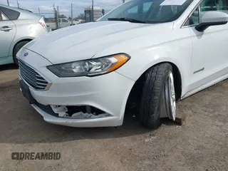 2018 Ford Fusion SE z VIN 3FA6P0LU5JR188171, wystawiony jako IAAI lot #41632358 z przebiegiem 73 677 mil mil oraz . Historia ofert i sprzedaży dostępna na DreamBid. Obrazek 6.
