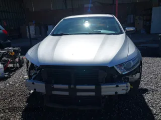 2015 Ford Taurus Limited with VIN 1FAHP2F81FG130088, listed as a IAAI auction lot 41738245 with 87,964 mi miles. Bid and sale history available at carsss.com. Image 13.