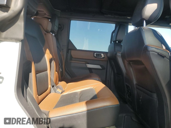 2023 Ford Bronco with VIN 1FMEE5BP0PLC06549, listed as a Copart auction lot 58703305 with 28,051 mi miles and Salvage title. Bid and sale history available at DreamBid. Image 11.