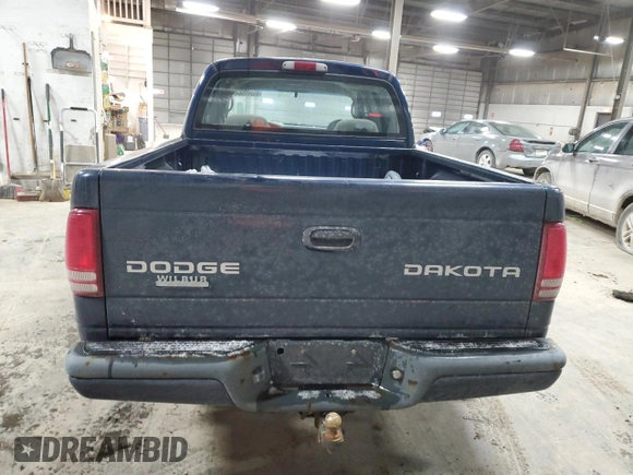 2004 Dodge Dakota Sport with VIN 1D7HL38NX4S579042, listed as a Copart auction lot 85283564 with 327,981 mi miles and Salvage Title. Bid and sale history available at carsss.com. Image 6.