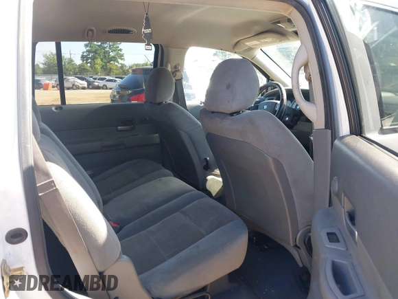 2005 Dodge Durango SLT z VIN 1D4HB48N65F500675, wystawiony jako IAAI lot #42743523 z przebiegiem 301 938 mil mil oraz . Historia ofert i sprzedaży dostępna na DreamBid. Obrazek 8.