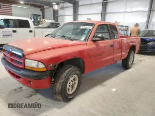 1999 Dodge Dakota SLT with VIN 1B7GG22X1XS295947, listed as a Copart auction lot 82611714 with Not Provided miles and Salvage Title. Bid and sale history available at carsss.com. Image 1.