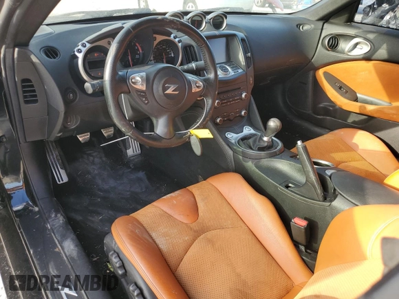 2014 Nissan 370Z z VIN JN1AZ4EH9EM636239, wystawiony jako Copart lot #69833264 z przebiegiem 110 802 mil mil oraz Szkoda całkowita • Salvage title. Historia ofert i sprzedaży dostępna na DreamBid. Obrazek 8.