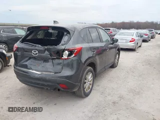 2015 Mazda CX-5 Touring with VIN JM3KE4CY1F0439016, listed as a IAAI auction lot 42039259 with 201,325 mi miles and . Bid and sale history available at carsss.com. Image 4.